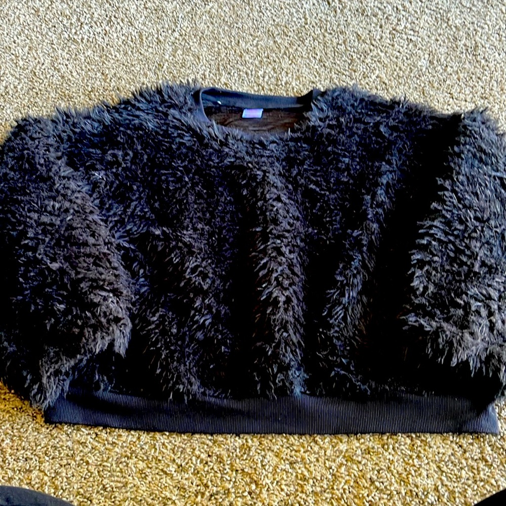 Emu faux sweater- Funky in all the fun ways!